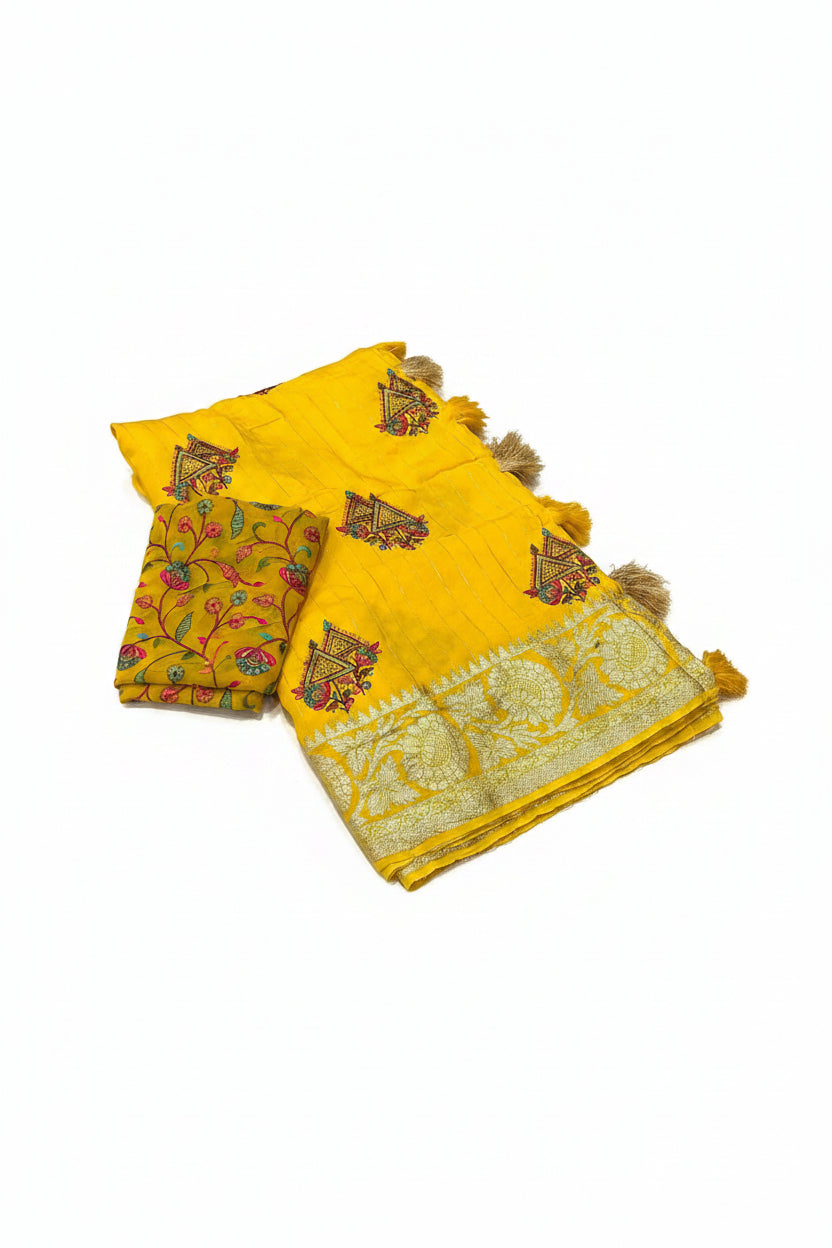 Yellow embroidered Kashmiri style fabric set with geometric and floral motifs, a matching folded piece, and tassels, displayed on a white background with text detailing the measurements and color.