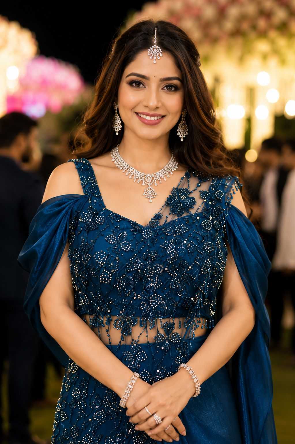 Woman in a blue dress with jewelry at an event