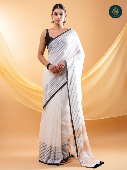 Chic White -  Mul Cotton Saree with Grid Border & Tassels