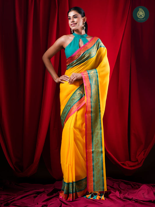 Sunlit Yellow Mul Cotton Saree with Teal Zari Border For women