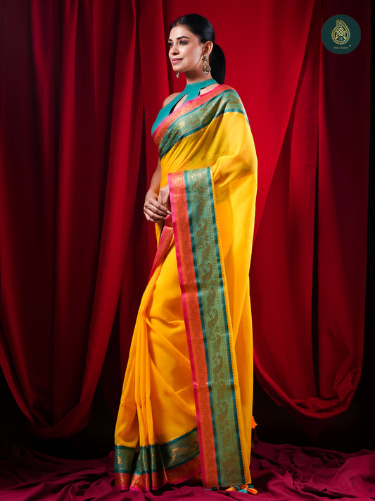 Sunlit Yellow Mul Cotton Saree with Teal Zari Border For women