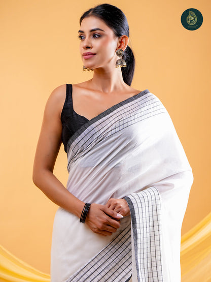 Chic White -  Mul Cotton Saree with Grid Border & Tassels