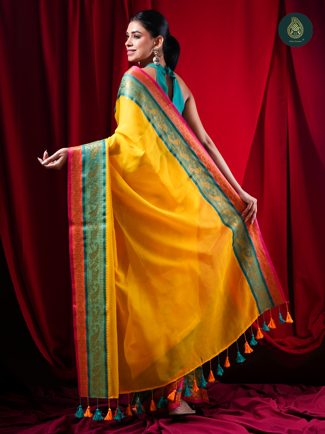 Sunlit Yellow Mul Cotton Saree with Teal Zari Border For women