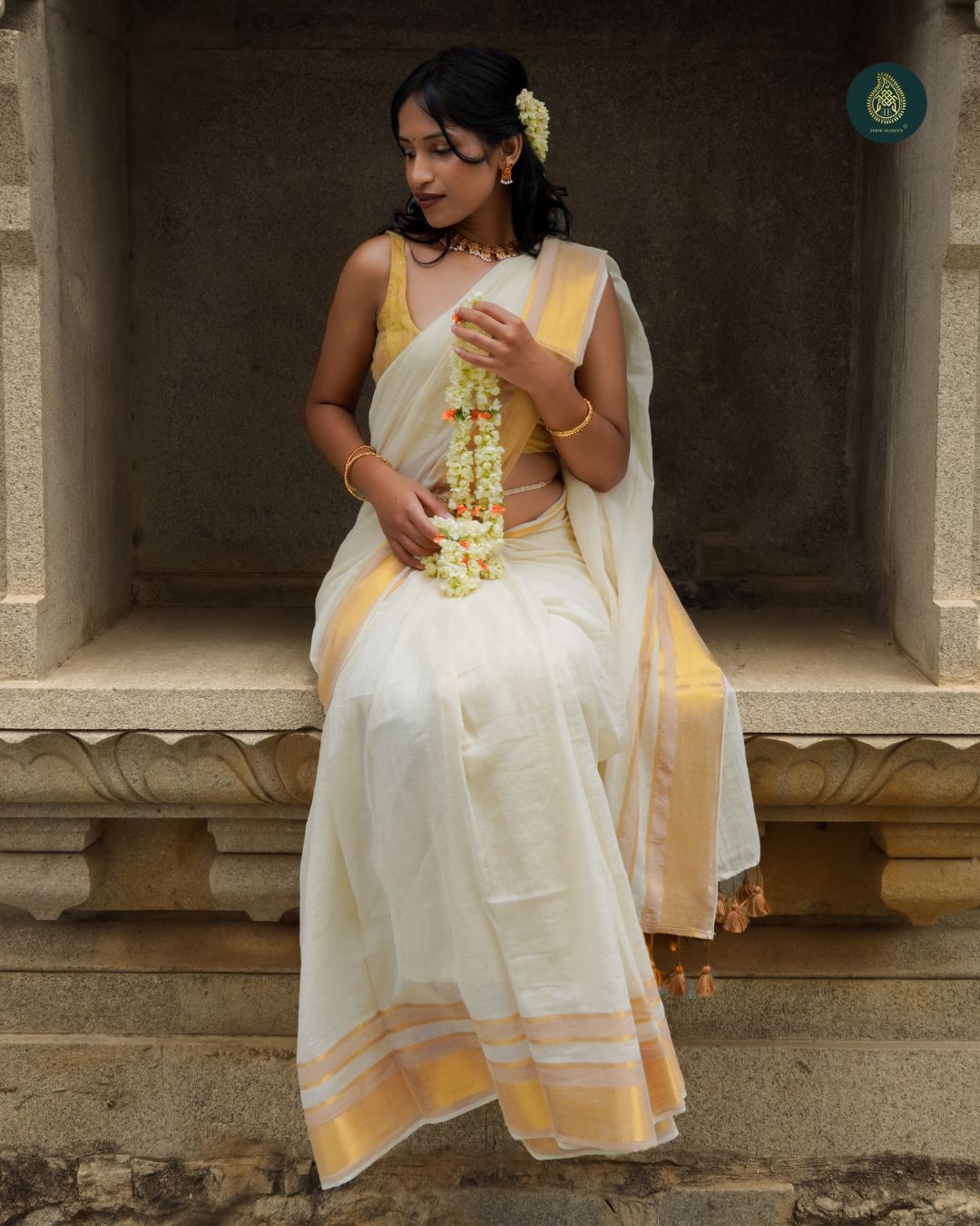 Classic Ivory Kasavu Mul Cotton Onam Saree with Golden Zari Border