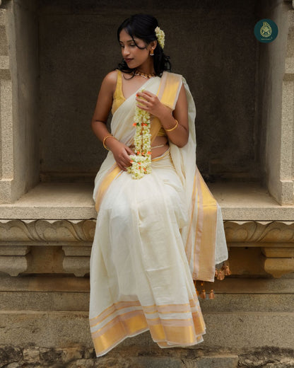Classic Ivory Kasavu Mul Cotton Onam Saree with Golden Zari Border