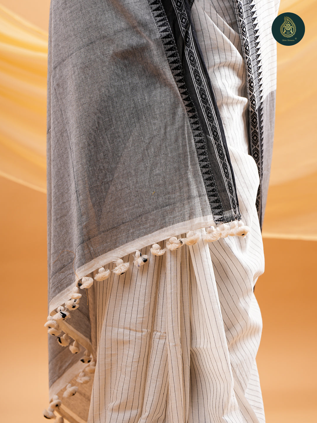 Stately Off-White -  Mul Cotton Saree with Traditional Temple Border