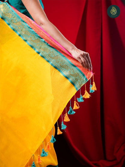 Sunlit Yellow Mul Cotton Saree with Teal Zari Border For women