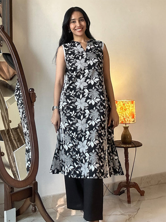 Janasya Women's Black Pure Cotton Floral Printed A-line Kurta Pant Set