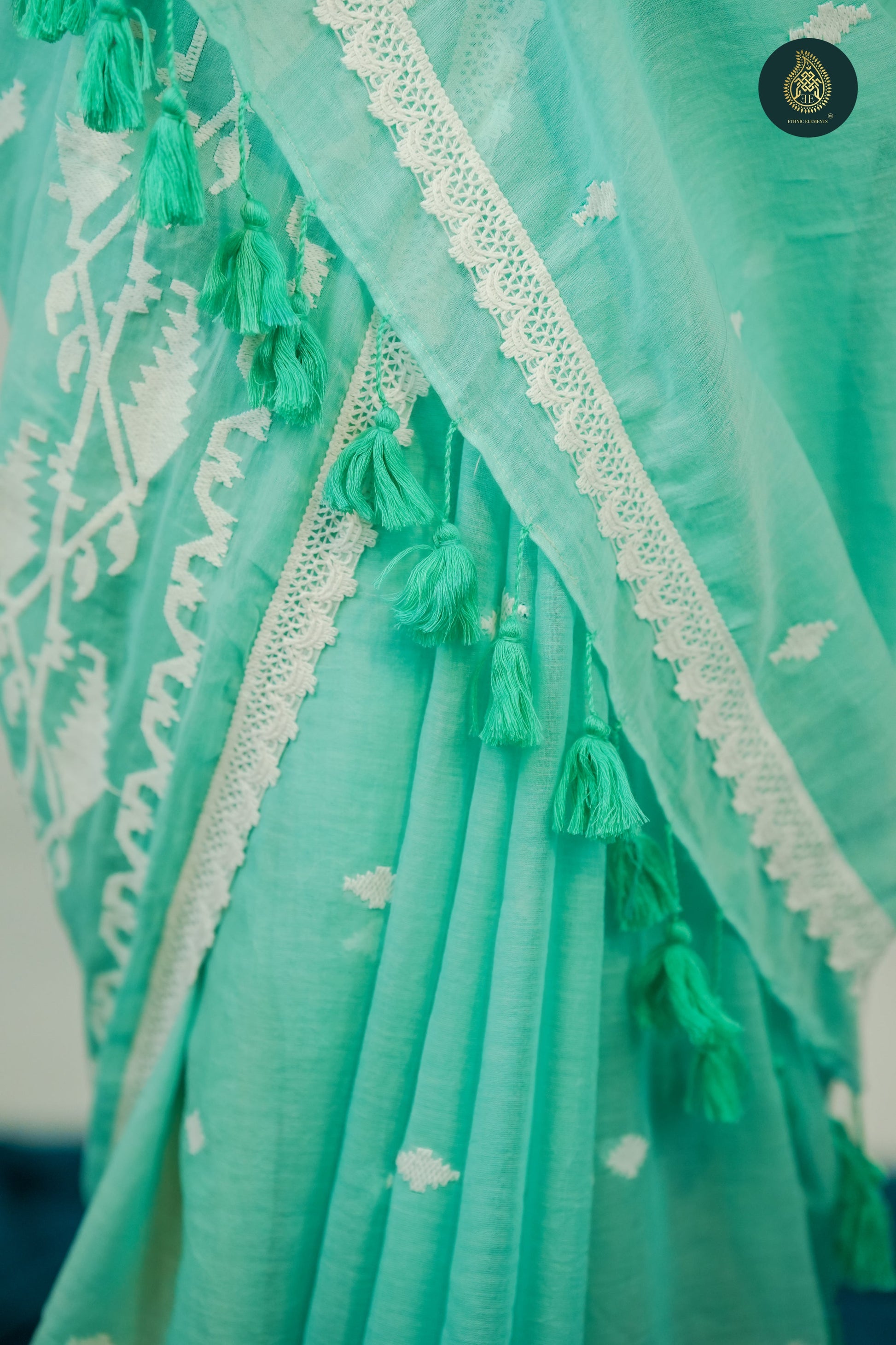 Mint Green Mul Cotton Saree with White Woven Motifs