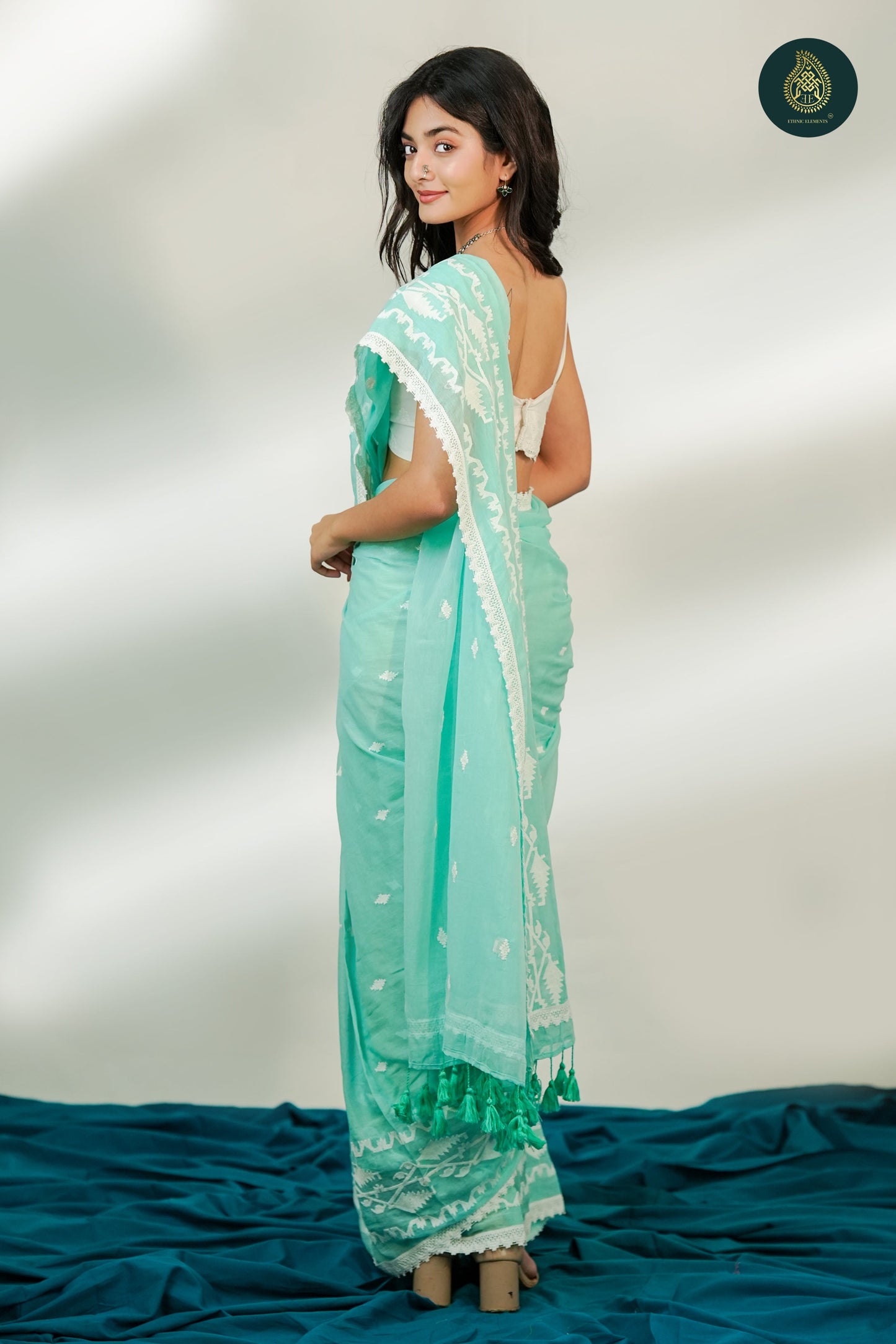 Mint Green Mul Cotton Saree with White Woven Motifs