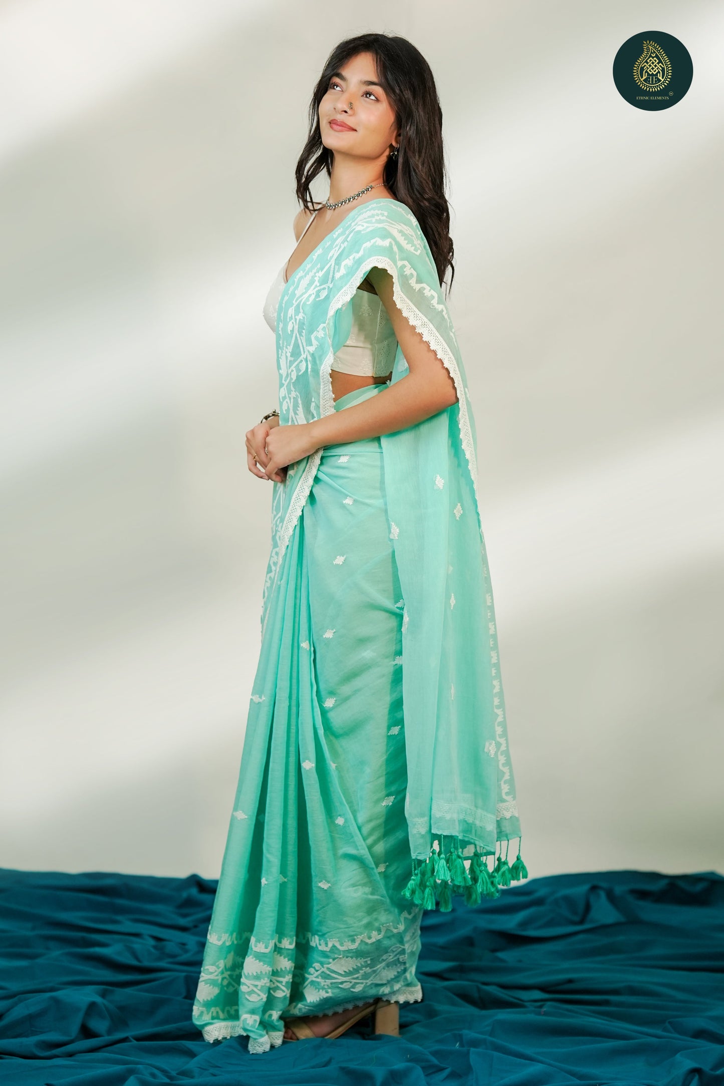 Mint Green Mul Cotton Saree with White Woven Motifs