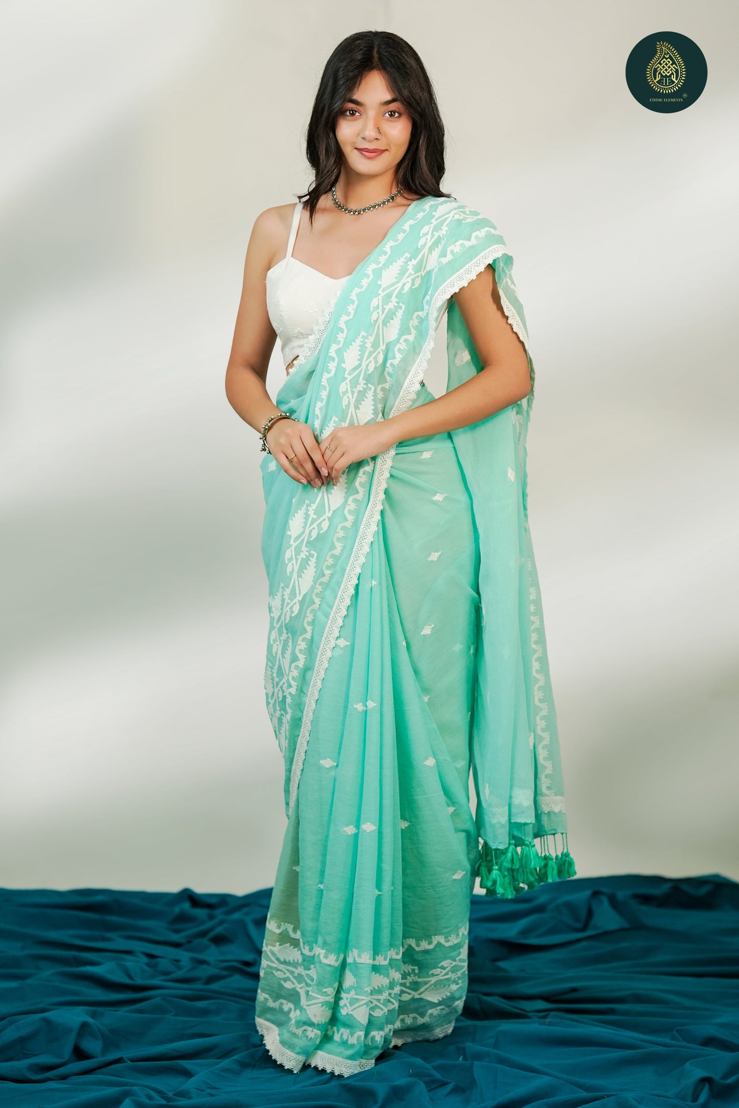 Mint Green Mul Cotton Saree with White Woven Motifs