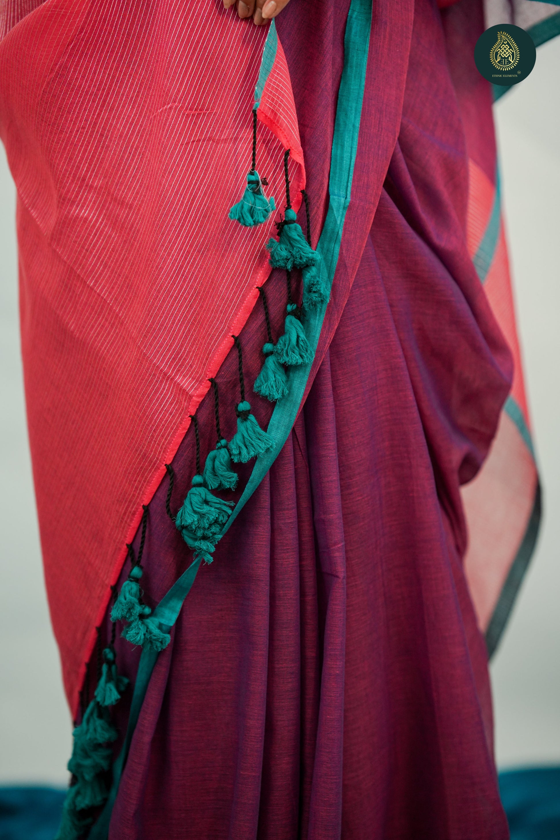 Plum Magenta Mul Cotton Saree with Coral Striped Pallu & Tassel Detail For Women