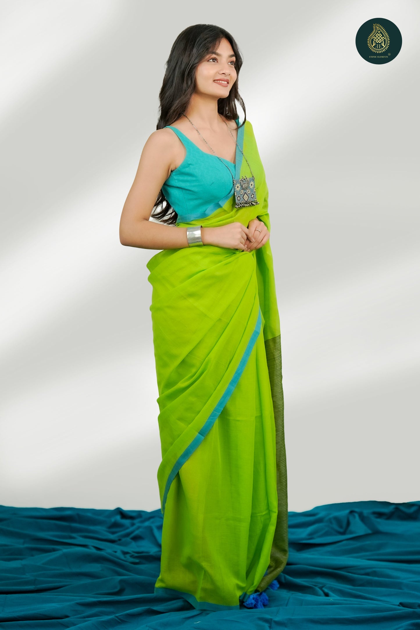 Lime Green Mul Cotton Saree with Aqua Blue Striped Pallu & Tassel Detail For Women