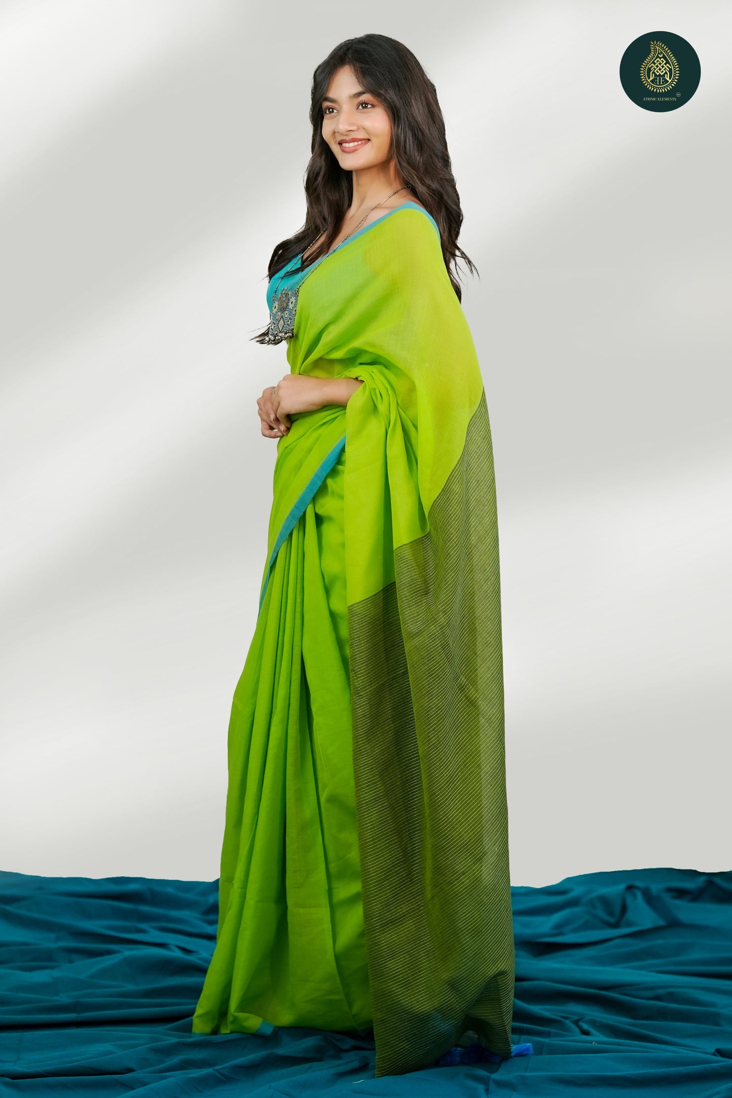 Lime Green Mul Cotton Saree with Aqua Blue Striped Pallu & Tassel Detail For Women
