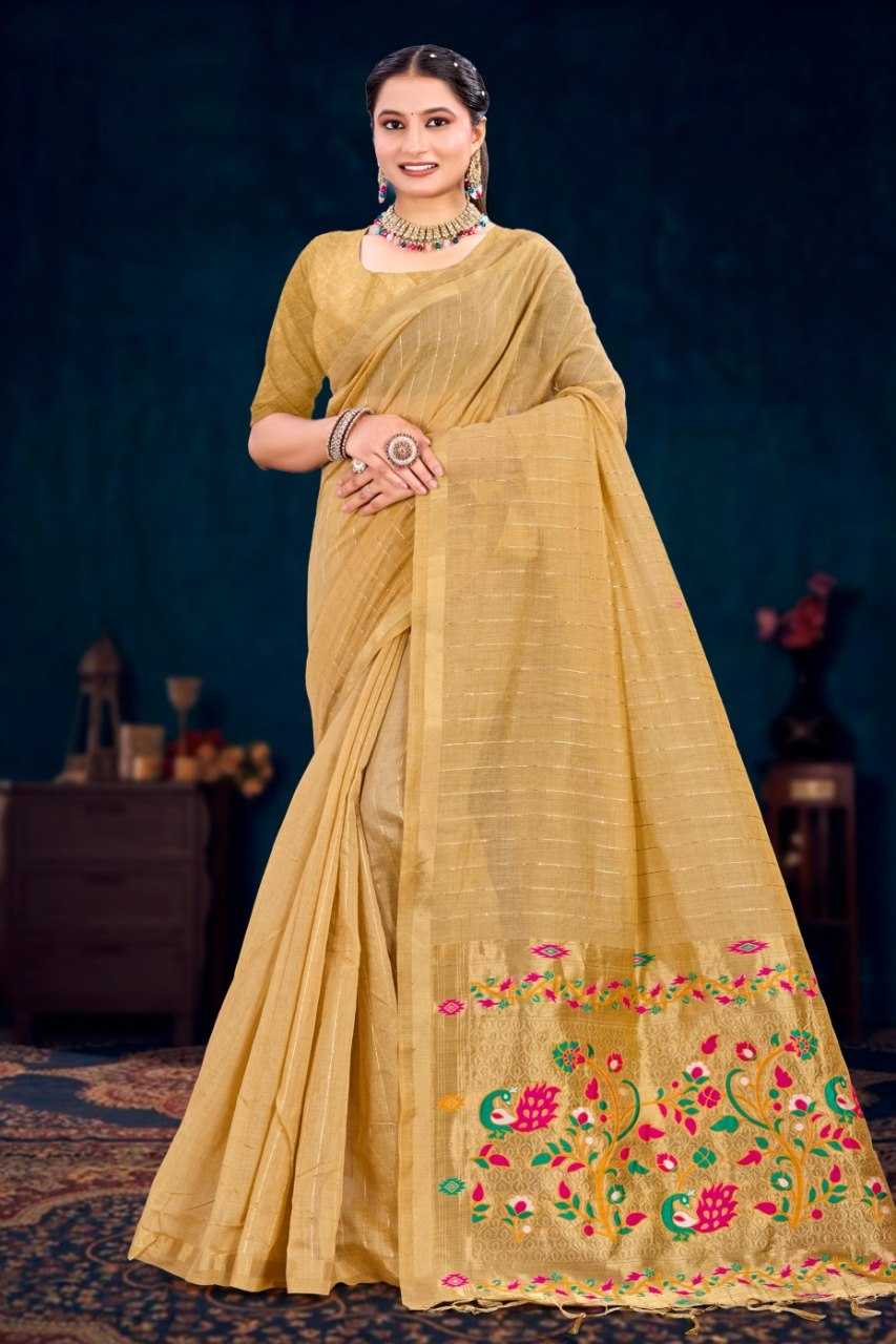 Woman wearing a yellow saree with floral embroidery against a dark background