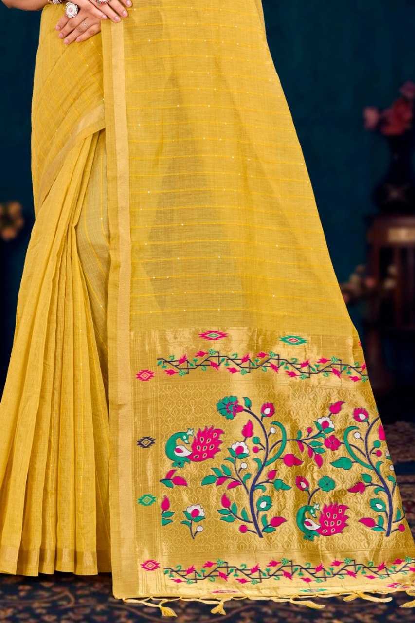 Yellow saree with floral embroidery on a dark background