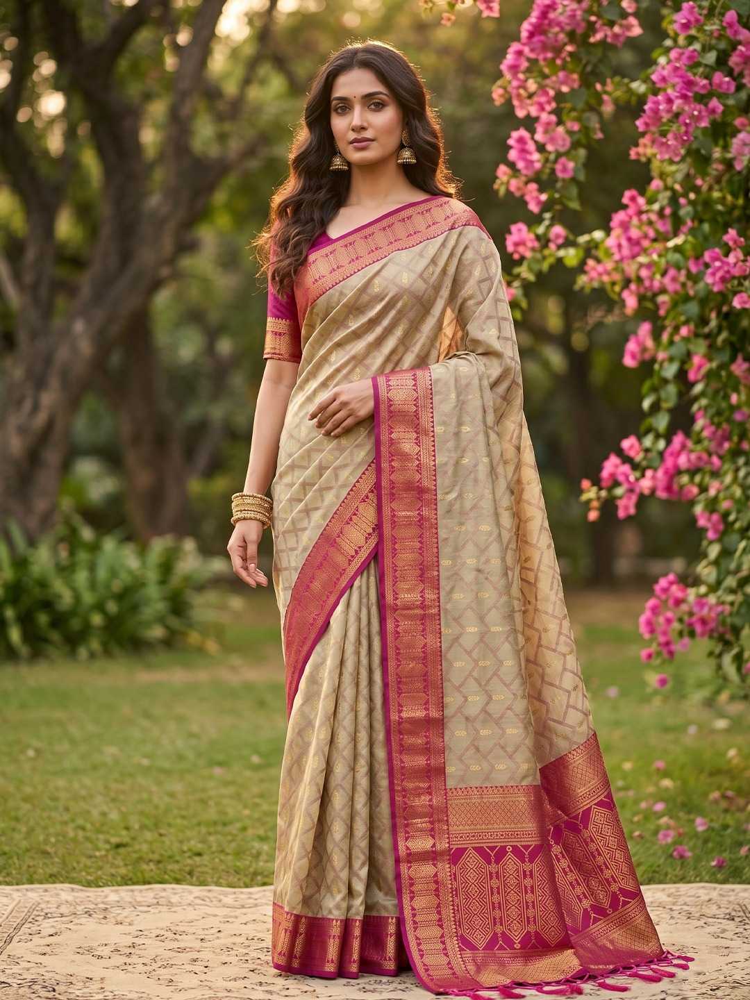 Woman wearing a traditional saree in a garden setting