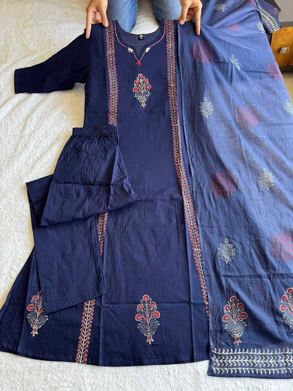 Navy blue embroidered traditional outfit with a dupatta on a white surface