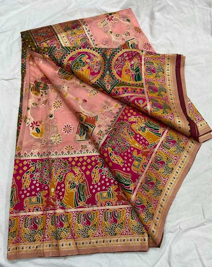 Colorful traditional saree with intricate patterns on a white background