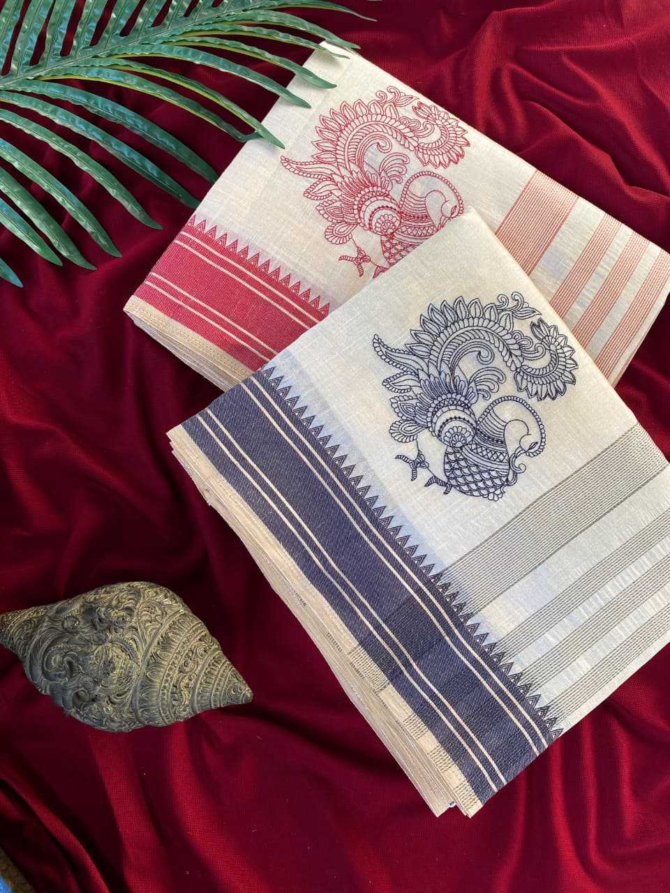 Two patterned cloths on a red fabric background with green leaves.