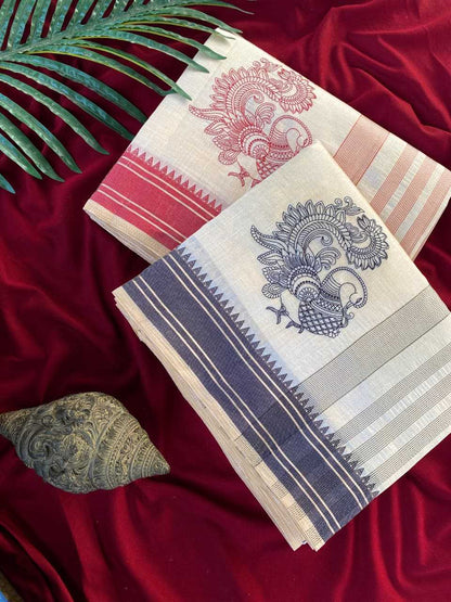 Two patterned cloths on a red fabric background with green leaves.