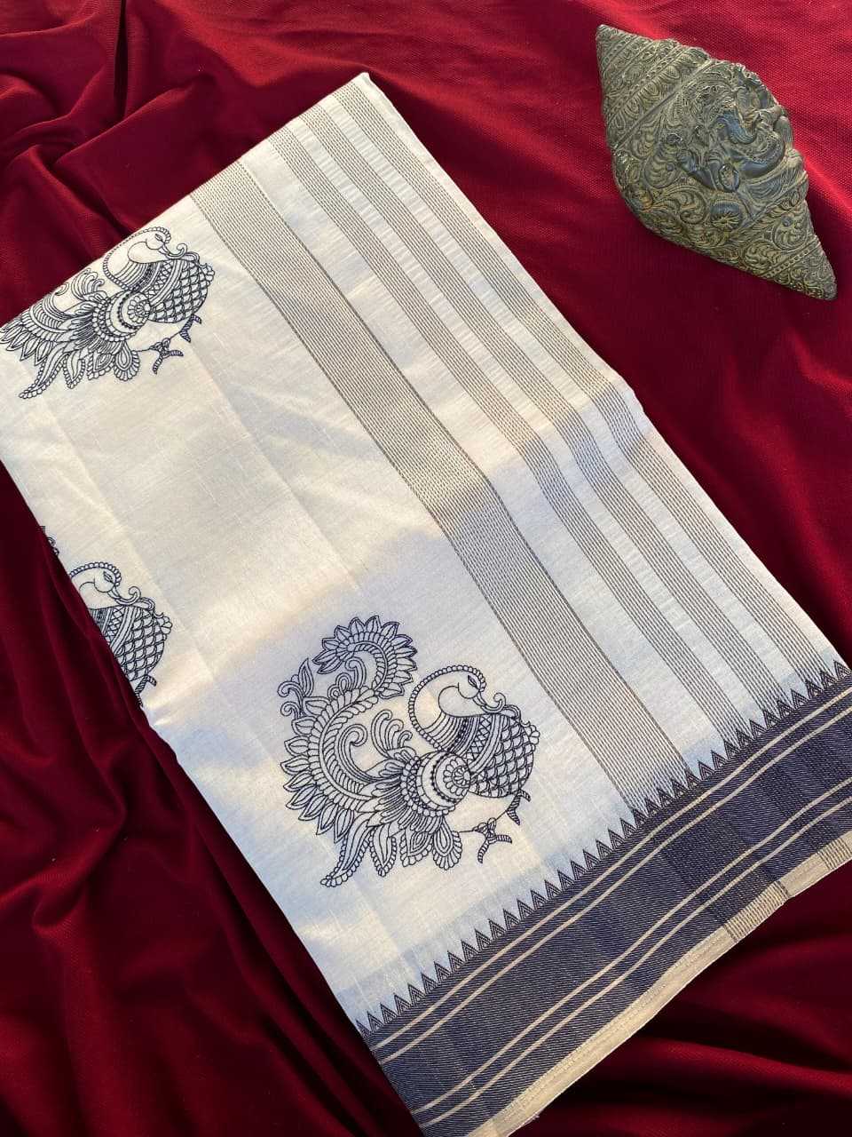 White fabric with blue patterns on a red background