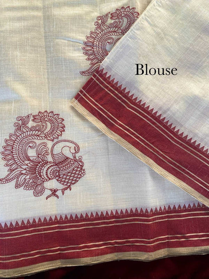 White blouse with red and gold embroidery and border