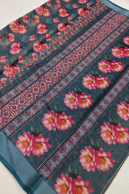 Floral and patterned fabric with pink flowers on a blue background