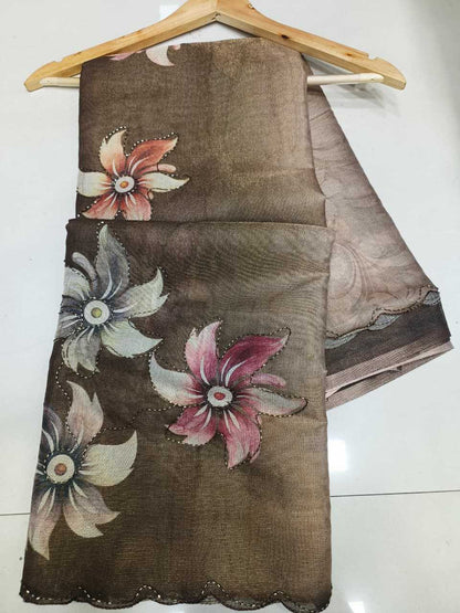 Floral-patterned fabric on a hanger against a white background