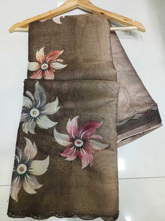 Floral-patterned fabric on a hanger against a white background