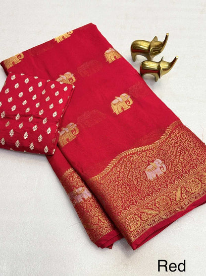 Red fabric with gold elephant patterns on a white background