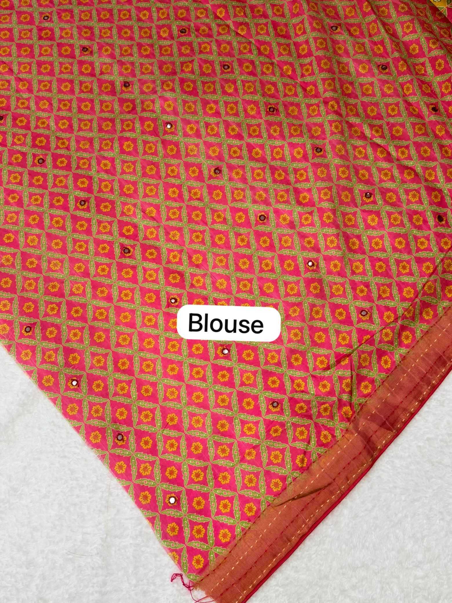 Red and pink patterned fabric with 'Blouse' label on a white background