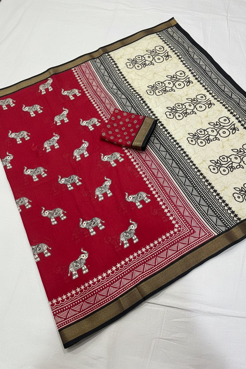 Red fabric with elephant patterns on a white background