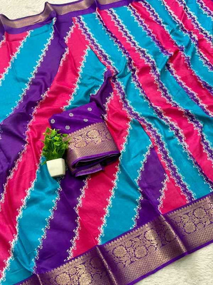 A folded and draped silk saree with diagonal stripes of turquoise, magenta pink, and purple, featuring a wide gold brocade border and a matching fabric piece with a small green plant accent.