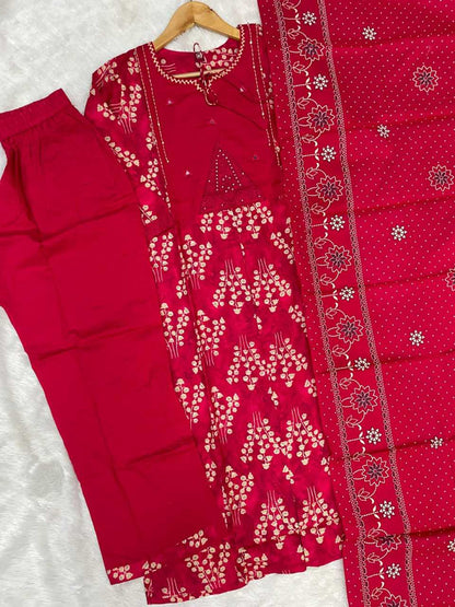 Red traditional outfit with floral patterns on a white background
