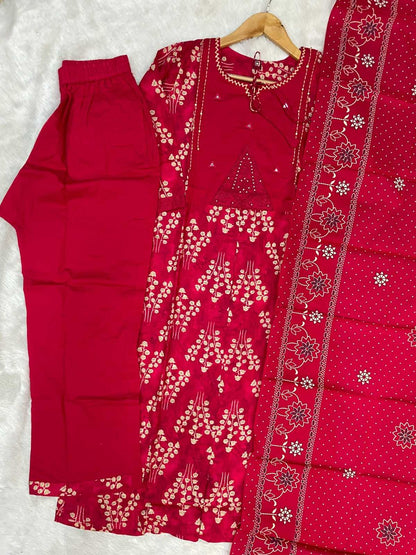 Red traditional outfit with floral patterns on a white background