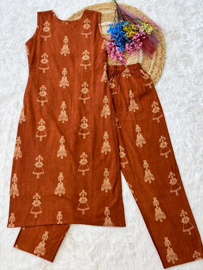 Brown traditional outfit with floral arrangement on a textured white background