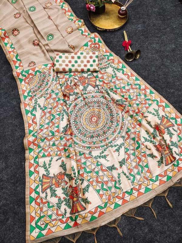 A beige cotton fabric garment laid flat on a dark gray surface, featuring intricate multicolor hand-painted motifs including a central mandala, floral patterns, and geometric borders in green, orange, red, and yellow.
