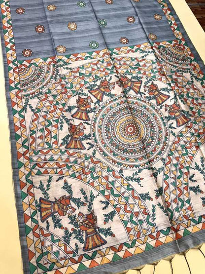 Decorative fabric with intricate patterns on a flat surface