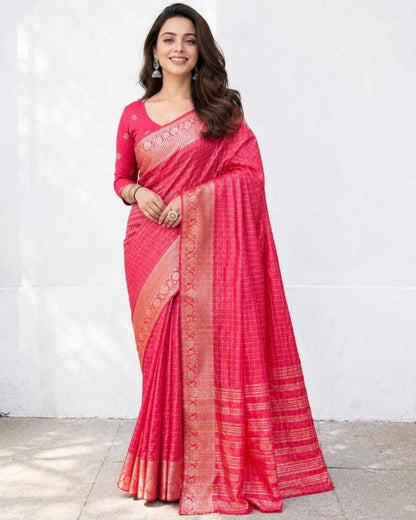 Woman wearing a pink saree with a white background
