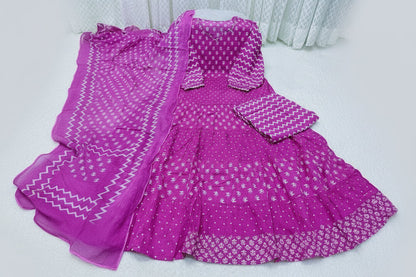 A magenta pink women's ethnic dress set with white printed patterns, including a long kurta, matching flared skirt, and dupatta, displayed on a light surface with a '3XL SIZE ONLY' label overlay.