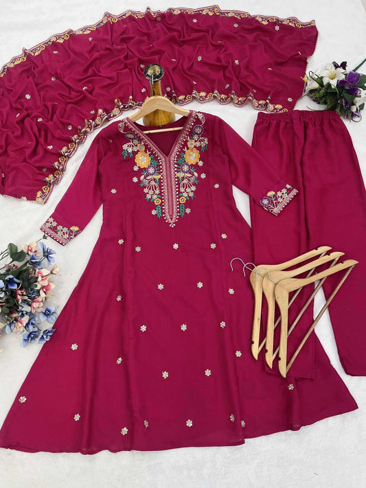 Maroon embroidered traditional outfit with matching pants on a white background