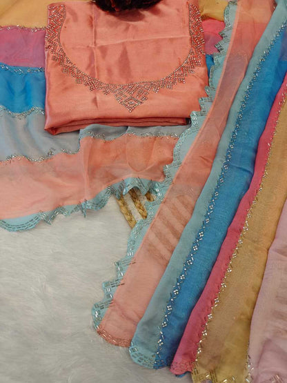 Colorful fabric with intricate patterns and embroidery on a textured surface