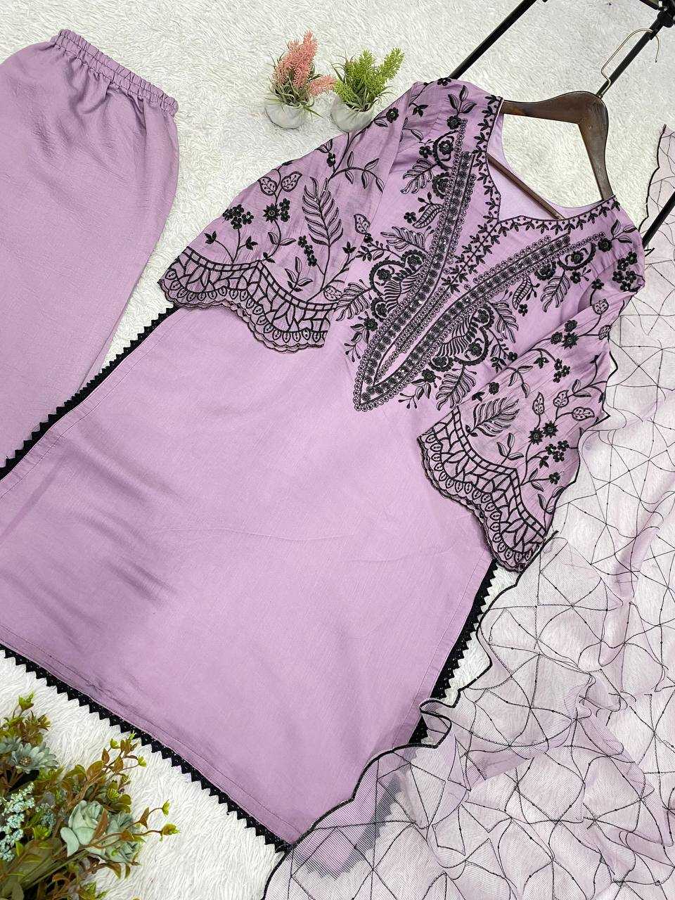 Purple embroidered top and pants with a floral pattern on a white background
