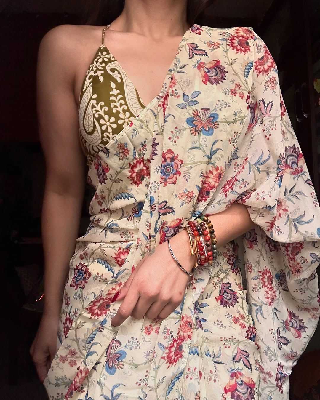 Woman wearing a floral dress with a dark background