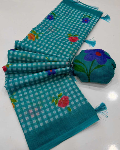 Turquoise checkered fabric with floral embroidery on a white background