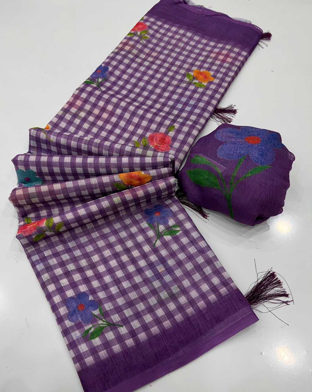 Purple checkered scarf with floral embroidery on a white background
