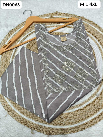 A folded women's kurta set in taupe gray and white, featuring vertical stripes on the body and white stripes with metallic gold embroidery on the yoke. The kurta is displayed on a wooden hanger over a round woven jute mat on a white textured background.