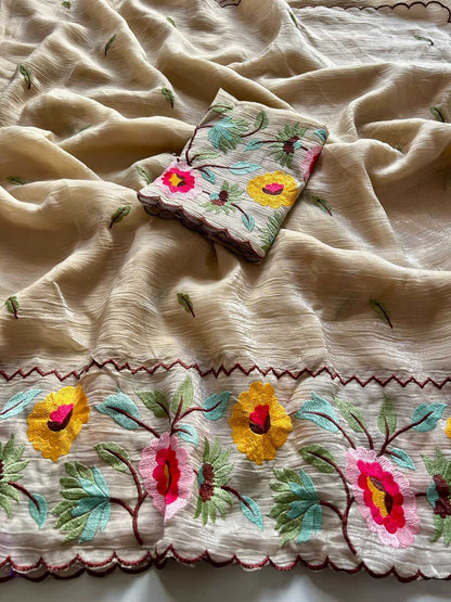 Embroidered fabric with floral patterns on a beige background